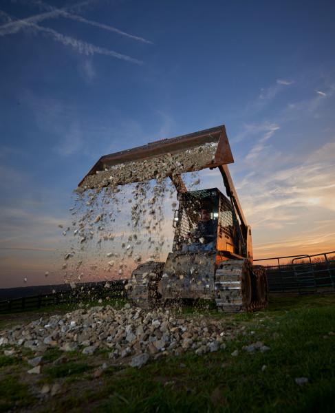 BZ551-5 LED Lights on loader moving rock piles at night