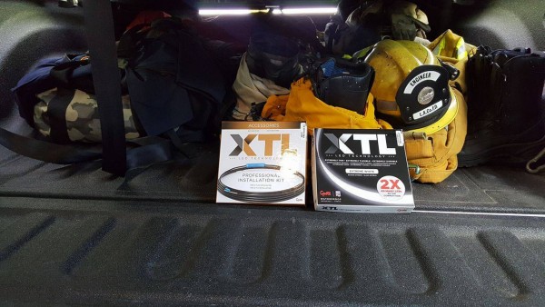 Grote XTL light strip boxes with fireman gear in back of truck