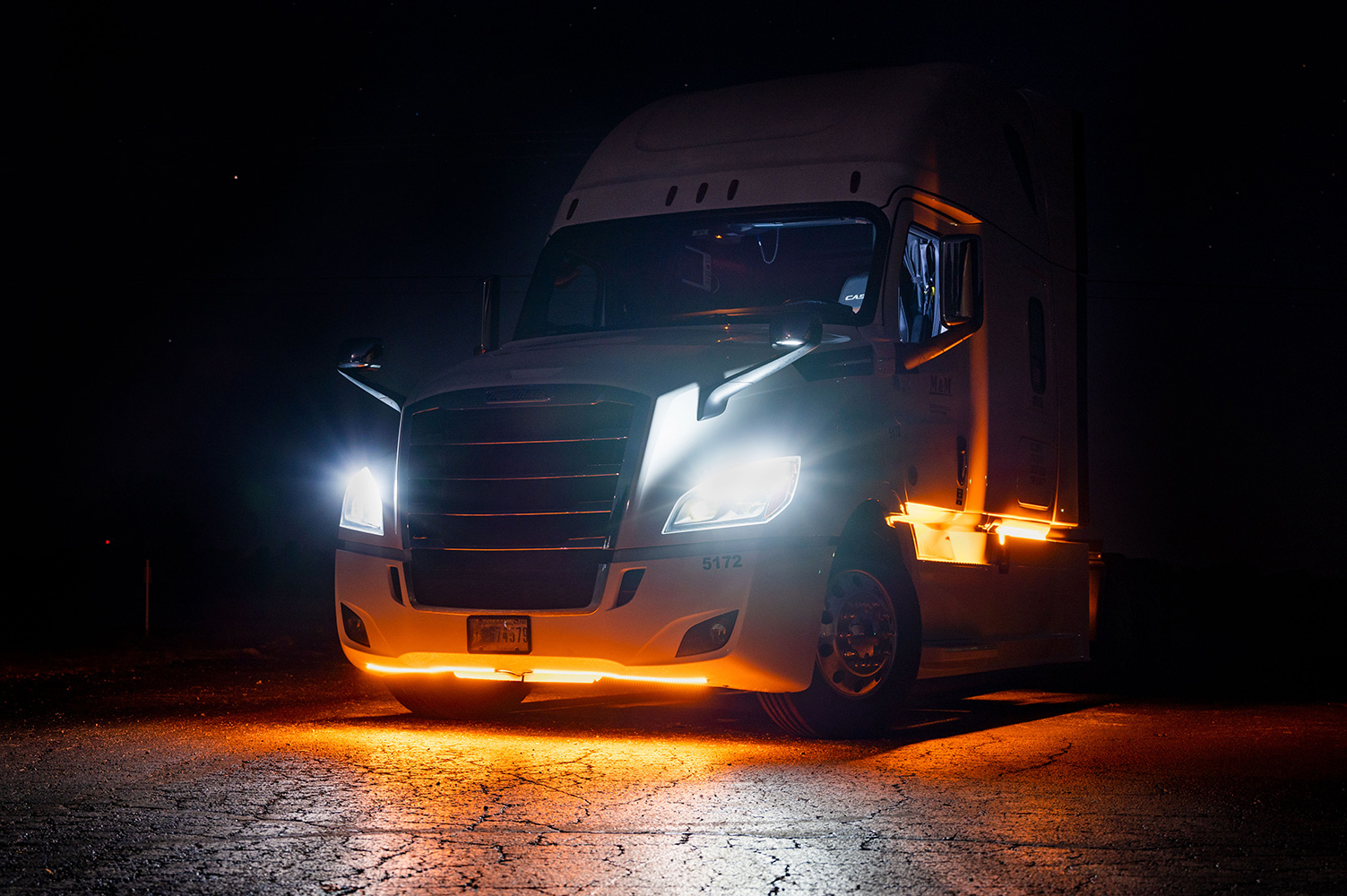 Semi truck with amber underglow